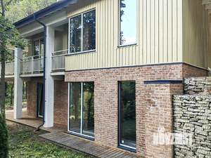 Коттедж 329м², 3-этажный, участок 8 сот.  